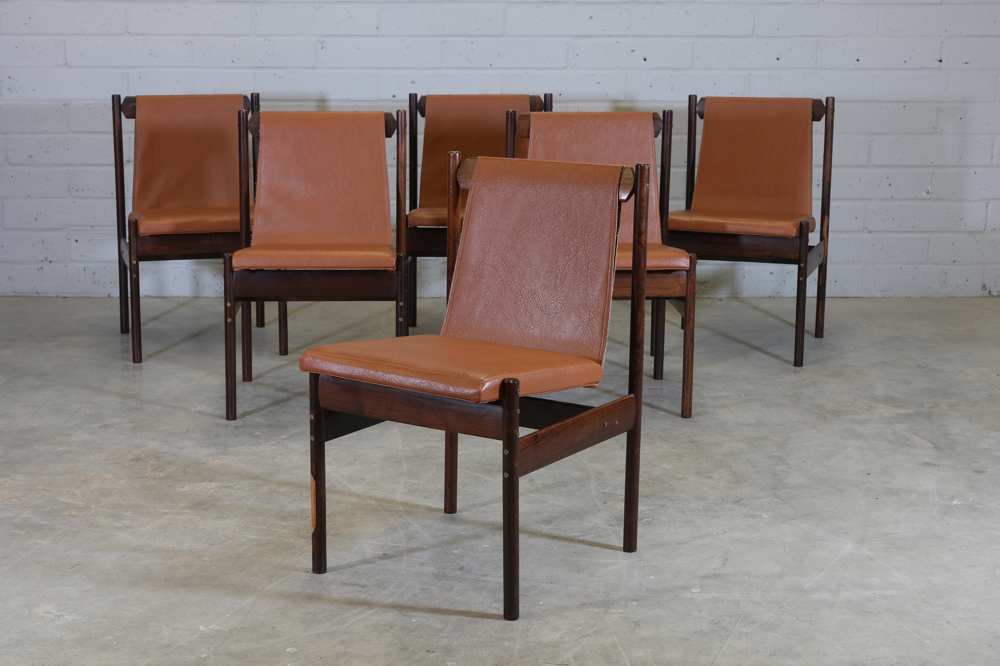 Lot 364 - A set of six Brazilian rosewood dining chairs